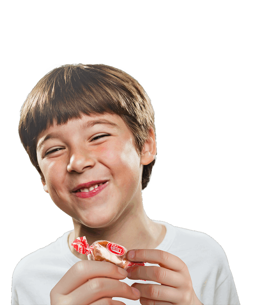 Smiling Boy with a Caramel Cream