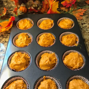 Pumpkin caramel muffins in the muffin baking tray prepped for the oven