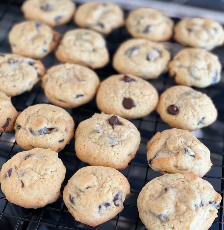 Rows of caramel brownie chocolate chip cookies straight out of the oven.